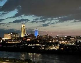 Missouri River through downtown Omaha at night